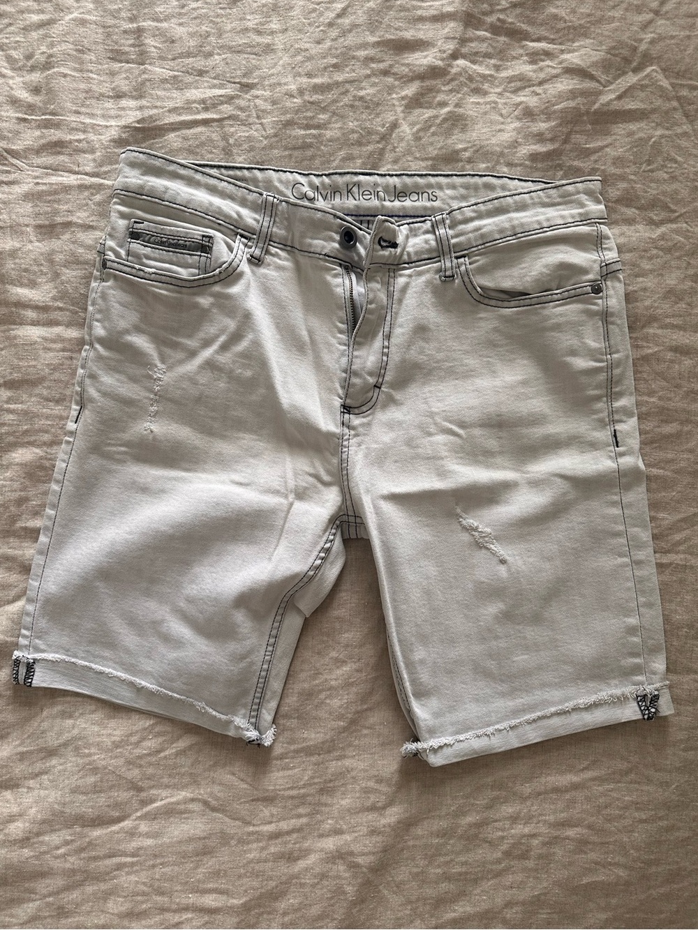Calvin Klein Light White Denim Jean Shorts with Raw Hem